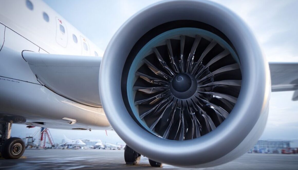 Airplane turbofan engine on the runway highlighting key distinctions between turbofan vs turbojet engines in aviation technology.
