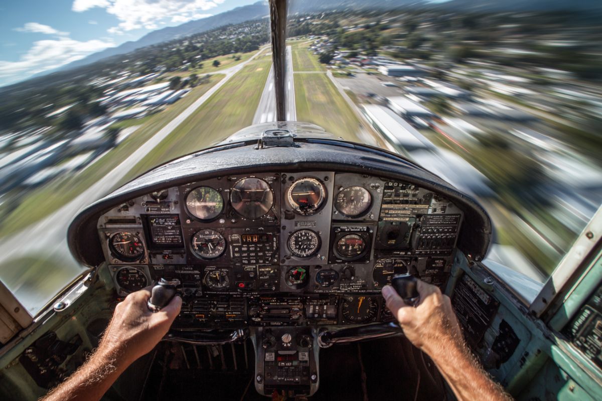 Pilot’s point of view during takeoff showing cockpit instruments and runway, related to gyroscopic precession aviation